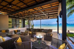 a restaurant with a view of the beach at Amari Vogue Krabi in Tab Kaek Beach