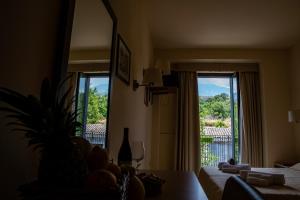 Postel nebo postele na pokoji v ubytování Hotel Milomax