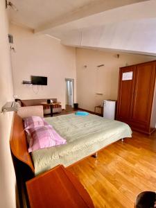 Postel nebo postele na pokoji v ubytování Esentai Hostel