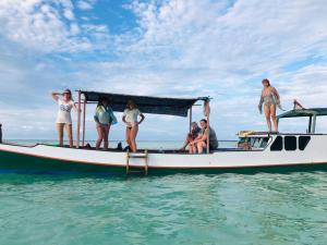 a group of people on a boat in the water at Alam Kita in Karimunjawa +84 photos