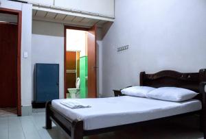 Krevet ili kreveti u jedinici u objektu Hotel Farallones Cali
