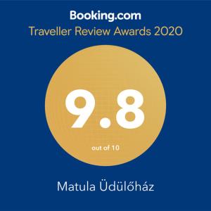 a yellow circle with the number eight and the words traveler review awards at Matula Üdülőház in Géberjén