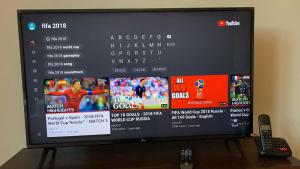 TV a/nebo společenská místnost v ubytování Panda Bella