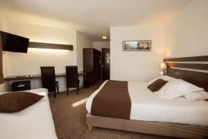 Postel nebo postele na pokoji v ubytování Hotel Chantereyne