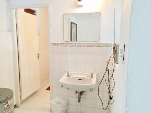 Vonios kambarys apgyvendinimo įstaigoje African Symbol Guest House
