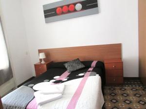 Кровать или кровати в номере Hostal Lima