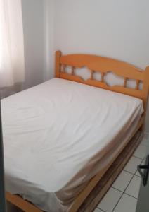 Ένα ή περισσότερα κρεβάτια σε δωμάτιο στο Residencial Varanda dos Buritis