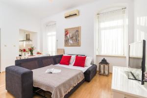 Posteľ alebo postele v izbe v ubytovaní Apartman Lussi