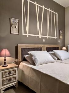 A bed or beds in a room at Cicada Home