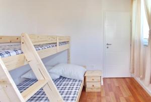 Postel nebo postele na pokoji v ubytování Apartments Maivjo