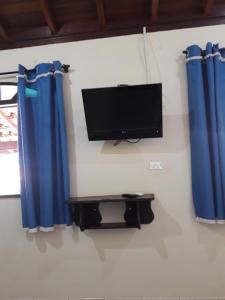 Et tv og/eller underholdning på Pousada Jacare Pepira