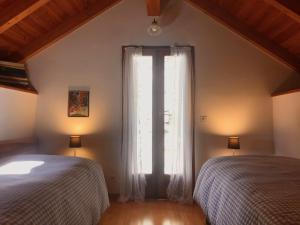 Postel nebo postele na pokoji v ubytování Tenuta Casa Cima - tenutacasacima com -