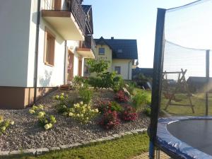 Vonkajšia záhrada v ubytovaní Domki Pod Magurą