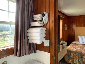 Ein Bett oder Betten in einem Zimmer der Unterkunft Sea Horse Inn and Cottages