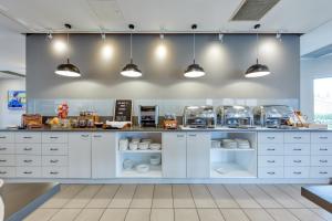 Køkken eller tekøkken på Best Western Melbourne Airport