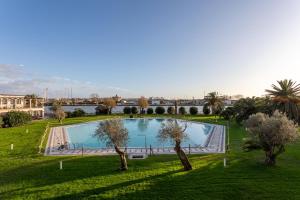 Bazén v ubytování Porto Romano - The Marina Resort nebo v jeho okolí