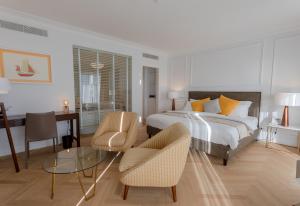 Postel nebo postele na pokoji v ubytování Porto Romano - The Marina Resort