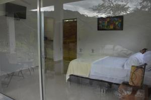 Voodi või voodid majutusasutuse San Juan de los Guayabos toas