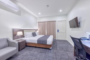 TV a/nebo společenská místnost v ubytování Best Western Melbourne Airport