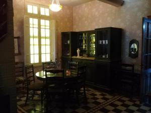 a dining room with a table and chairs at Casa de Campo Finca La Superiora in La Consulta