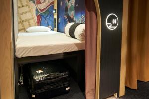 Giường trong phòng chung tại Resol Poshtel Tokyo Asakusa