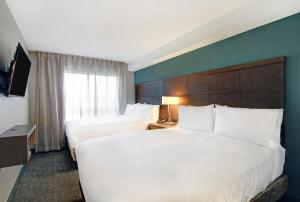 Postel nebo postele na pokoji v ubytování Staybridge Suites Toronto - Vaughan South by IHG