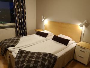 Letto o letti in una camera di Hotell Åsen