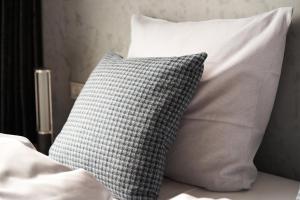 Postel nebo postele na pokoji v ubytování Hotel GUESTapart