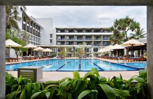 Bazén v ubytování Goldi Sands Hotel nebo v jeho okolí