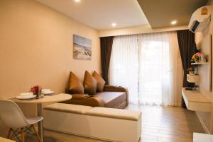 Posezení v ubytování Seven Seas Resort Pattaya & Sofa bed