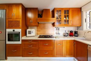 Kuchnia lub aneks kuchenny w obiekcie Merecido Descanso Sun Beach