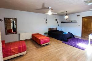 Łóżko lub łóżka w pokoju w obiekcie Merecido Descanso Sun Beach