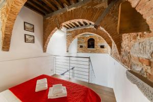 A bed or beds in a room at Medici Soderini