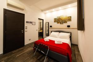 A bed or beds in a room at Medici Soderini