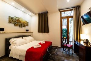 A bed or beds in a room at Medici Soderini