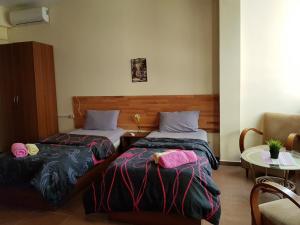 Letto o letti in una camera di Hotel Kurtabeg