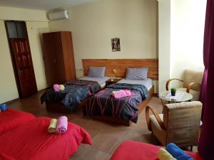 Letto o letti in una camera di Hotel Kurtabeg