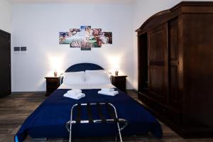 A bed or beds in a room at Medici Soderini