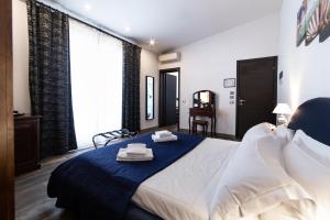 A bed or beds in a room at Medici Soderini