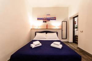 A bed or beds in a room at Medici Soderini