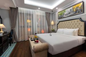 Postel nebo postele na pokoji v ubytování Babylon Premium Hotel & Spa