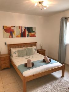 En eller flere senge i et værelse på Villa Maria Cala Murada