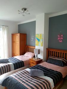 En eller flere senge i et værelse på Villa Maria Cala Murada