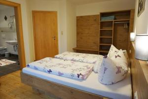 Letto o letti in una camera di Arenablick