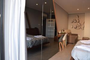 A bed or beds in a room at B&B Rakel Home