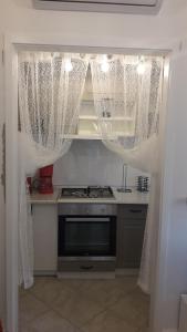 Apartment Bella 주방 또는 간이 주방