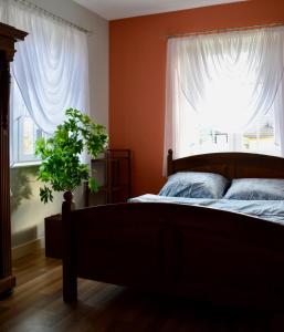 Кровать или кровати в номере Siedlisko Inwałd