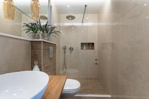 Ein Badezimmer in der Unterkunft Villa Biston