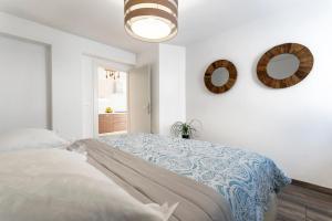 Ein Bett oder Betten in einem Zimmer der Unterkunft Villa Biston
