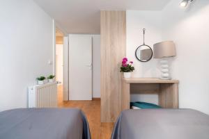 Ein Bett oder Betten in einem Zimmer der Unterkunft Villa Biston